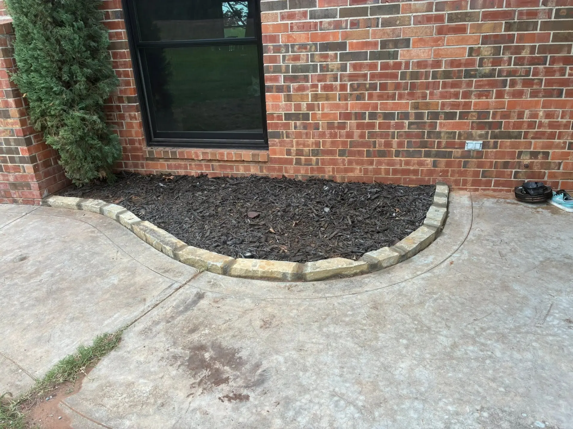 Stone Bordered Foundation Bed — Stone Border & Mulching in Oklahoma City, OK